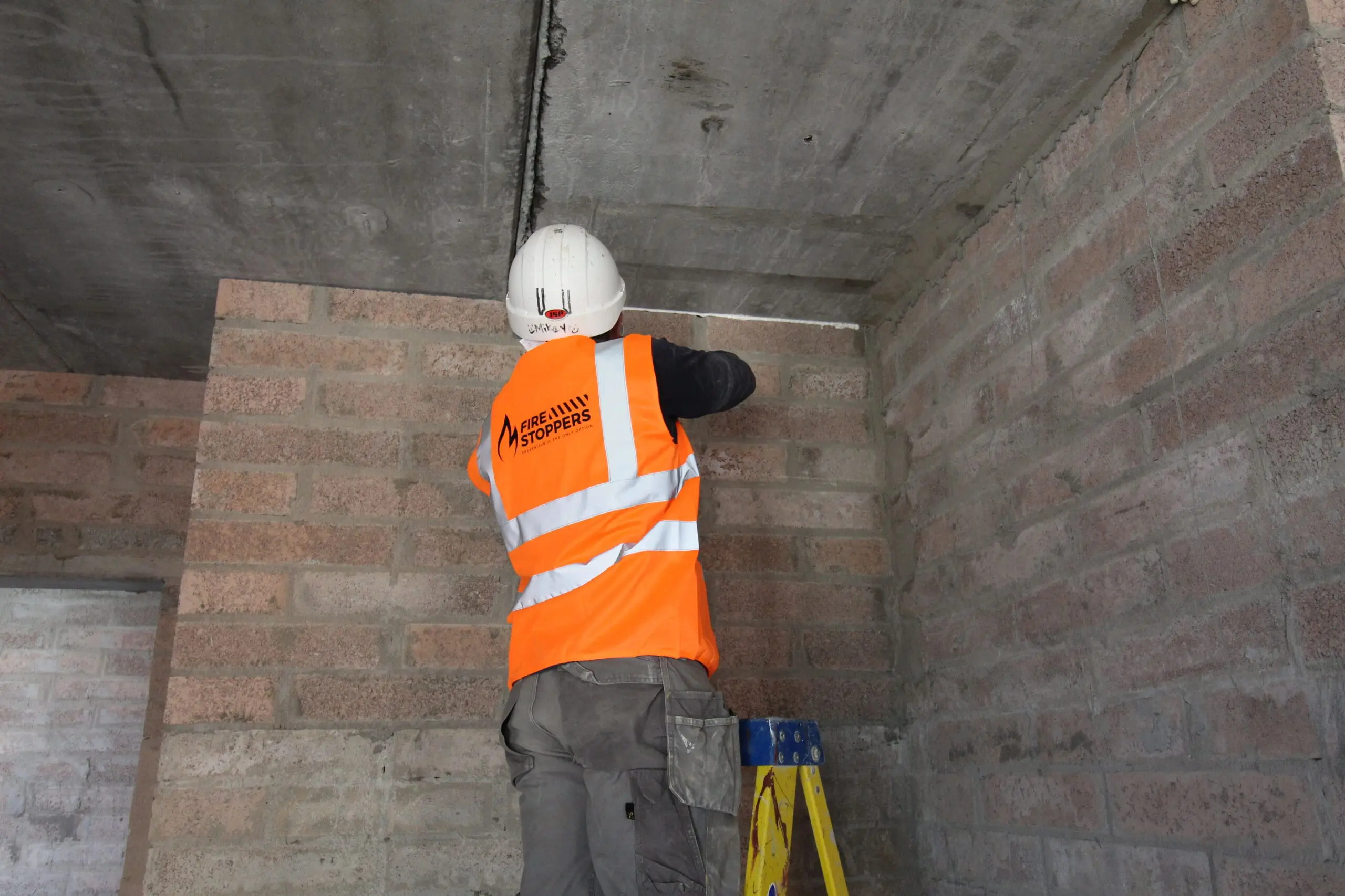 Firestopper expert doing a fire safety audit | Contact Us for Fire Safety Audits