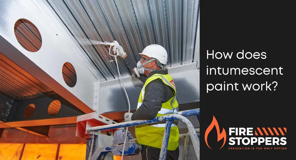 Blog article on how intumescent paint works, Man on lift in hi vis, spraying intumescent paint