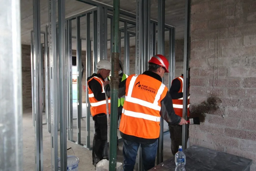 A GROUP OF ENGINNERS CONDUDCTING A FIRE SAFETY AUDIT
