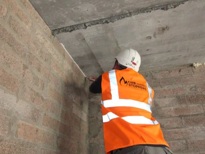 A Firestopper doing a fire safety inspection | Reach out to know more about us